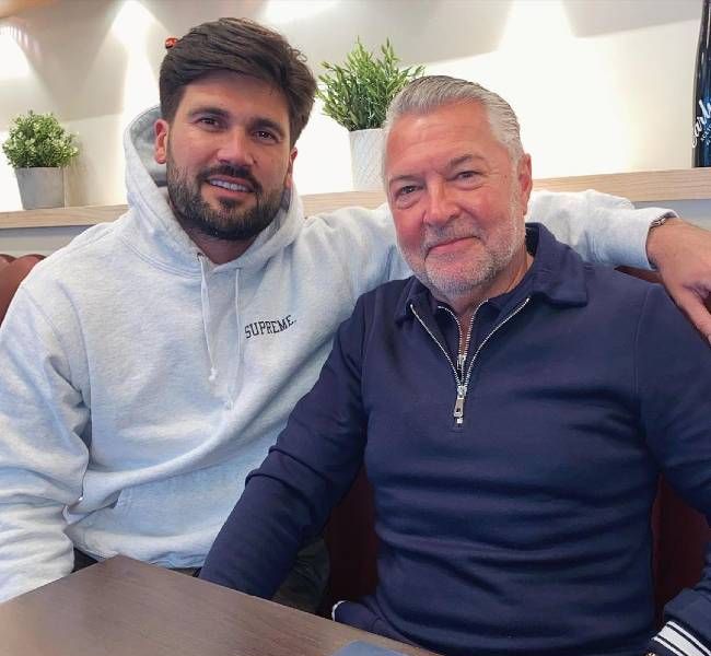 Dan Edgar as seen posing for a picture with his dad 