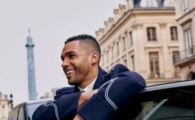 Emily in Paris fans wanted to know about Lucien Laviscount. (Source: British GQ)