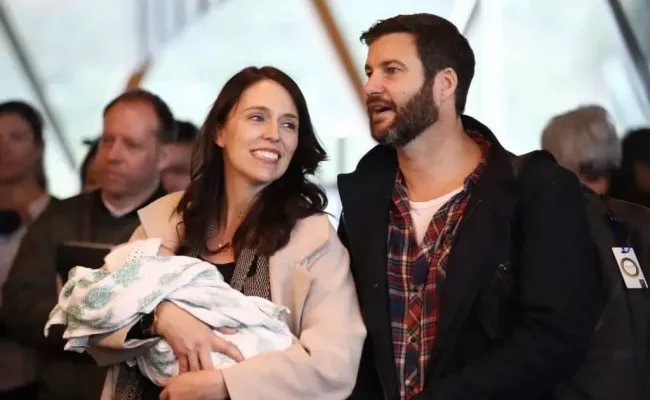 Jacinda Ardern and Clarke Gayford with their daughter. (Source: The New York Times)