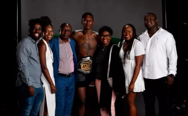 UFC Star Israel Adesanya, with his siblings and parents. (Source: NZ Herald)