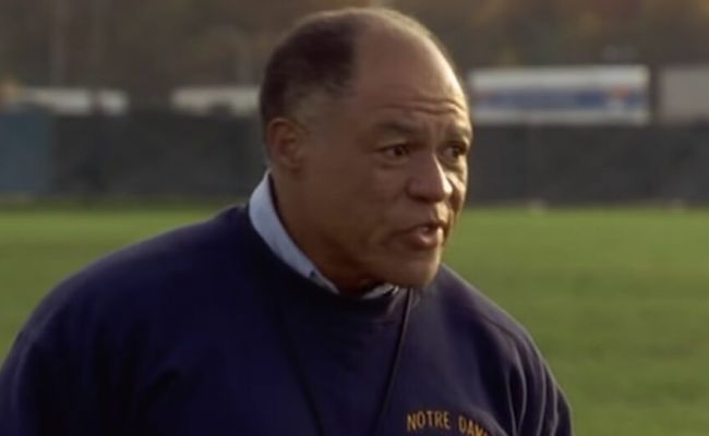 John Beasley portrayed Coach Warren in the acclaimed film Rudy. (Image Source: New York Post)