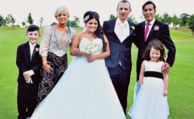 Christy Dignam and Kathryn celebrate their daughter Kiera’s wedding with grandchildren. (Image Source: RTE)